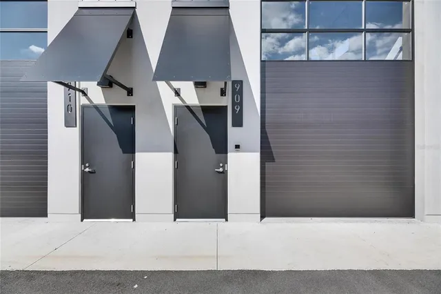 a view of staircase with white walls