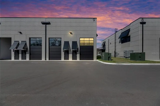a view of a building with a street