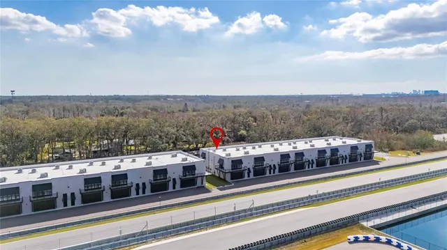 a view of a back yard of the house