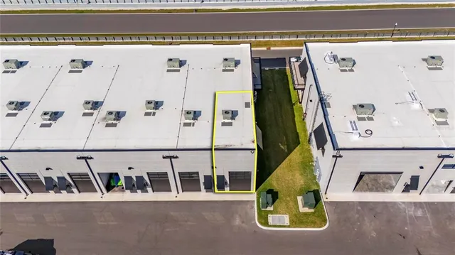 a view of a building with lake view and mountain view