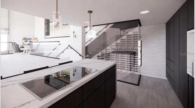 a kitchen with a stove and a refrigerator