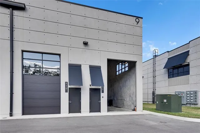 a view of a brick house with a street