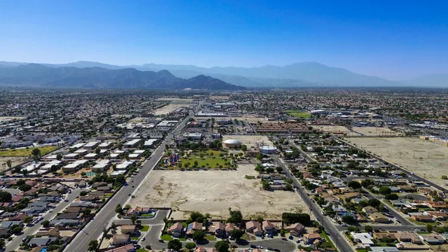 an aerial view of a residential houses and city view