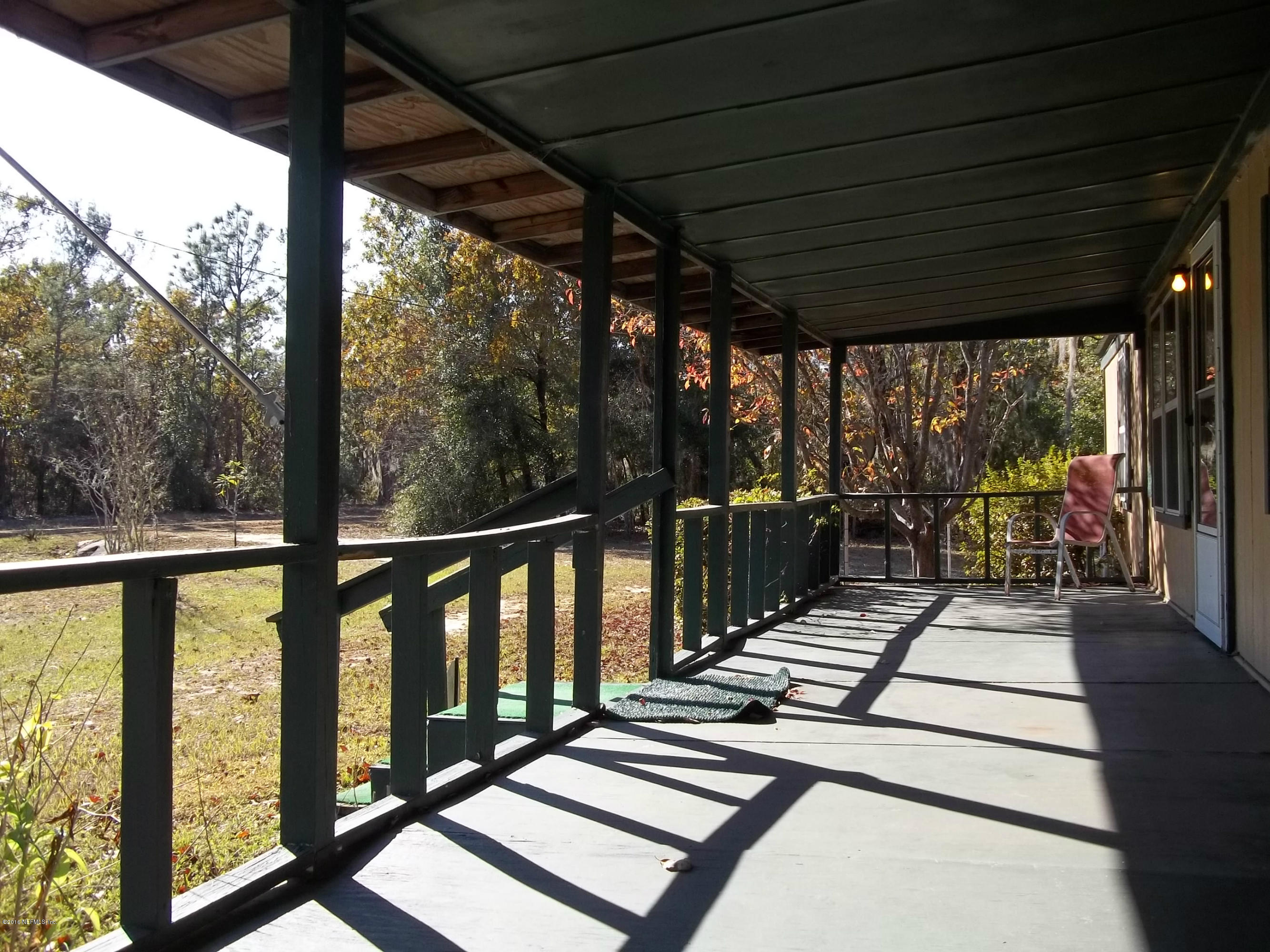 108 Randy Street Interlachen, FL 32148 - Photo 3 of 12 front porch