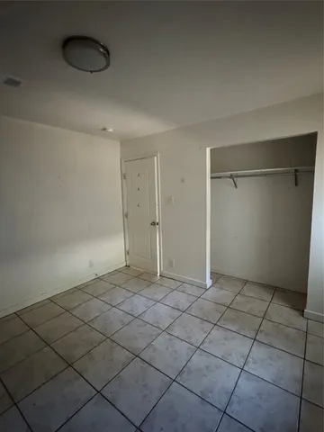 an empty room with a door