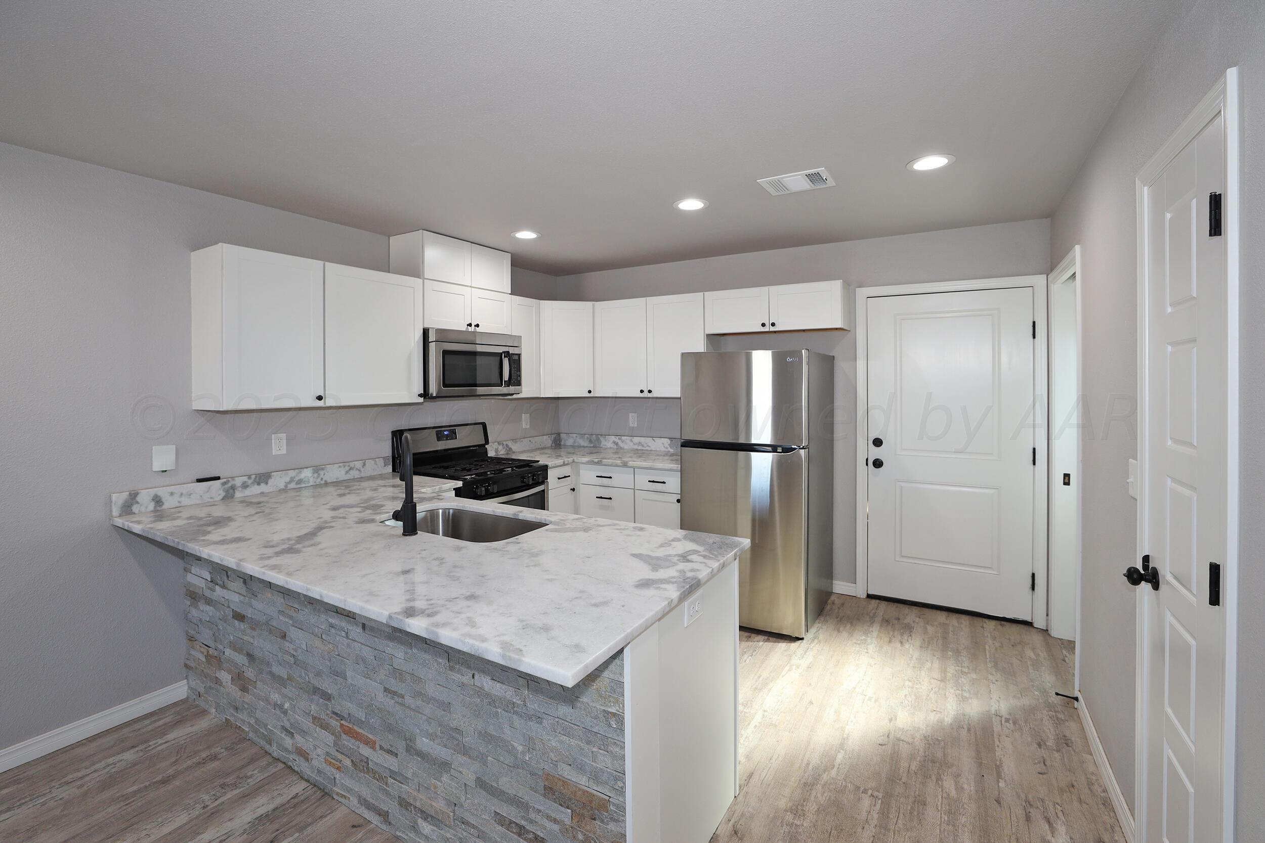 8945 Redbud Road Amarillo, TX 79119 - Photo 6 of 21 Kitchen2