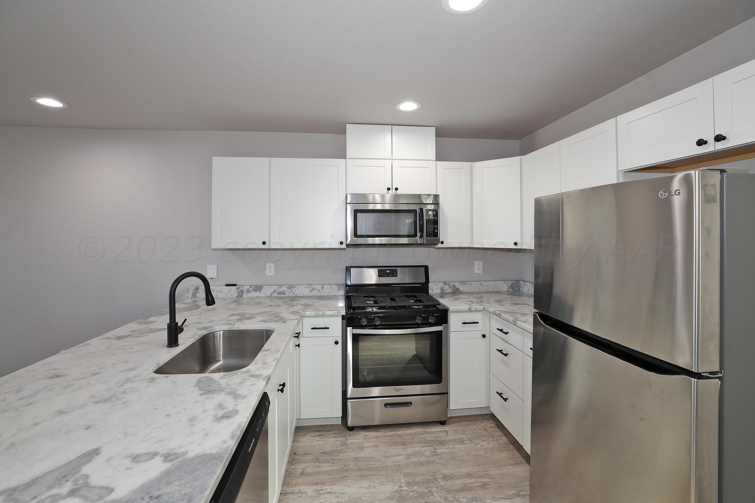 8945 Redbud Road Amarillo, TX 79119 - Photo 8 of 21 Kitchen3