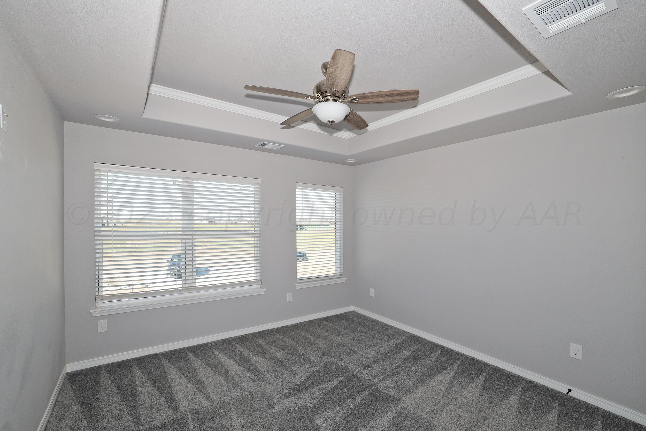 8945 Redbud Road Amarillo, TX 79119 - Photo 9 of 21 Master Bedroom