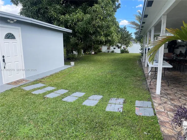 a view of a backyard with a garden