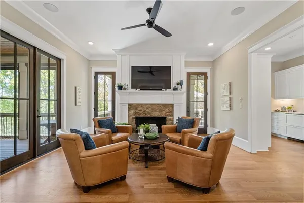 a bathroom with a granite countertop sink a toilet and a bathtub