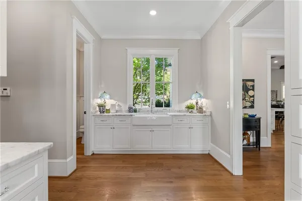 a view of a house with swimming pool and sitting area