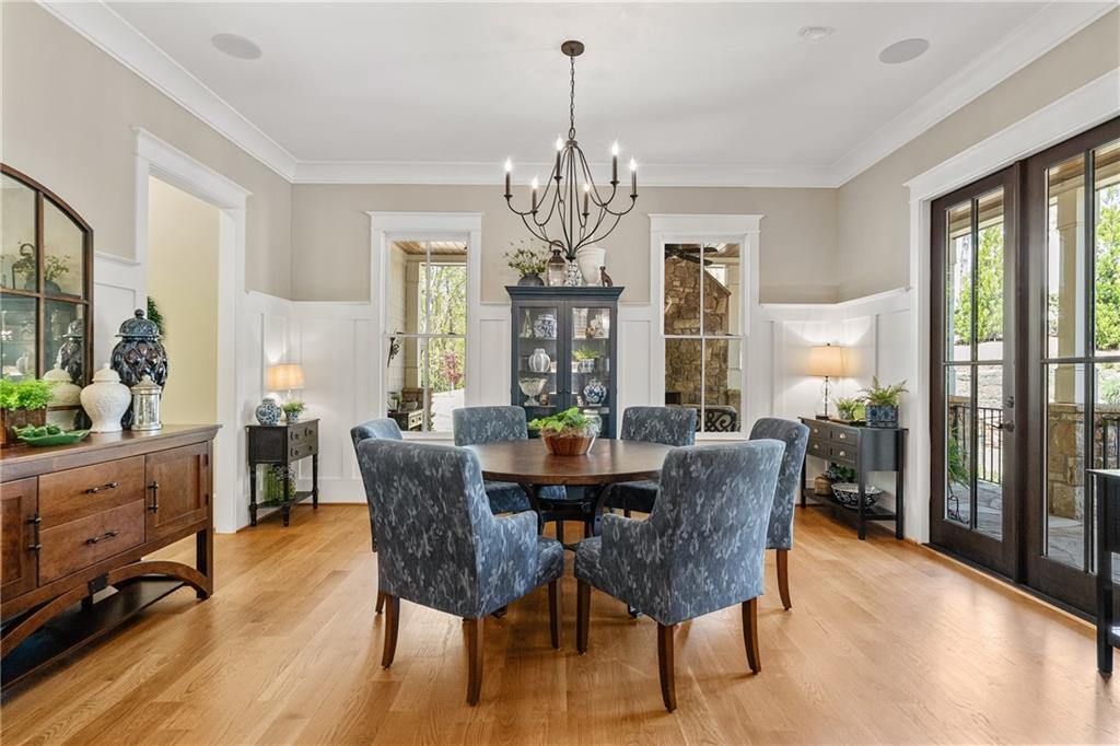 16200 Henderson Road Milton, GA 30004 - Photo 30 of 95 a view of a dining room with furniture window and wooden floor