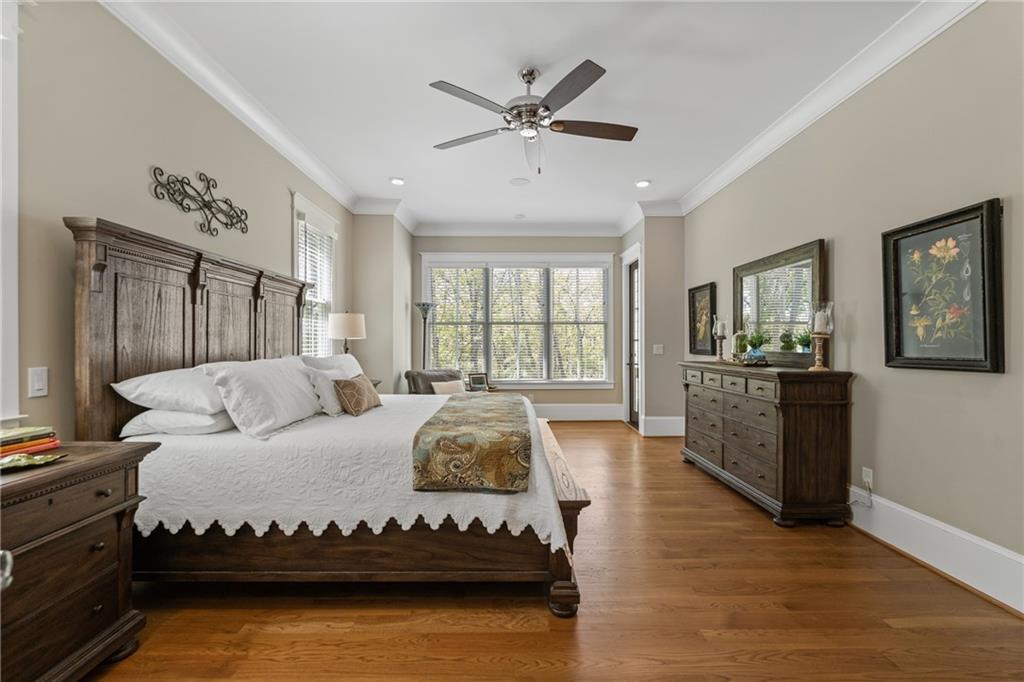 16200 Henderson Road Milton, GA 30004 - Photo 34 of 95 a bedroom with a large bed and a window