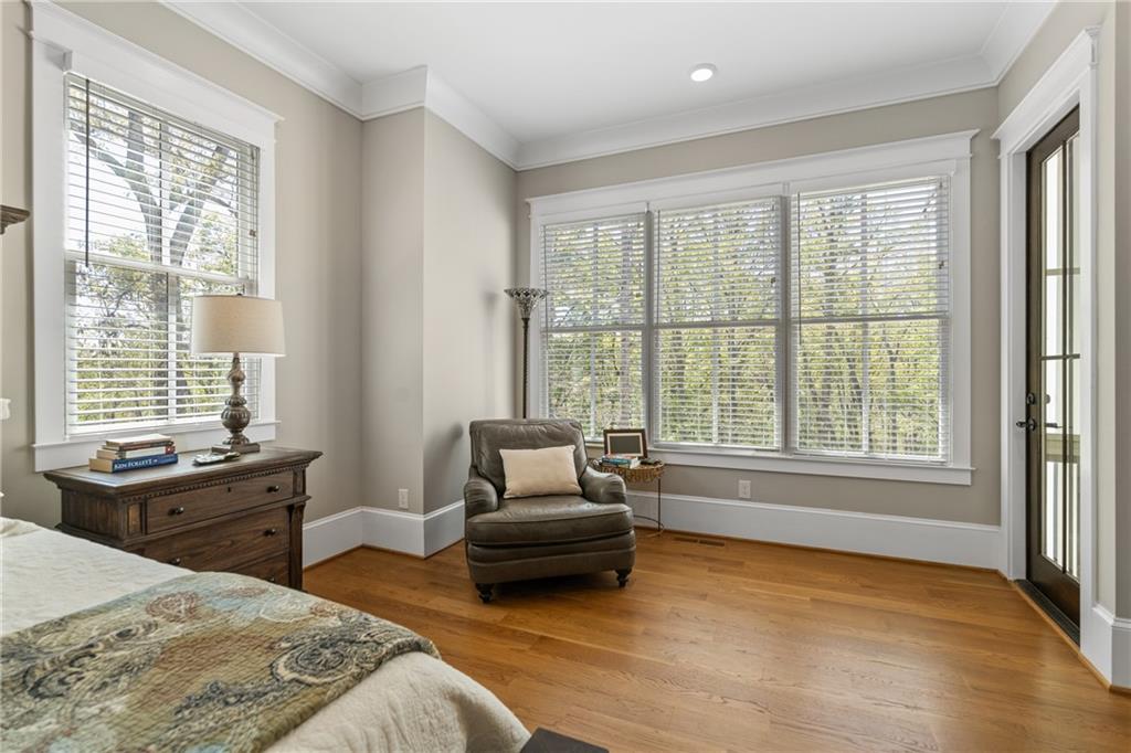 16200 Henderson Road Milton, GA 30004 - Photo 35 of 95 a bedroom with a bed and a couch next to a window