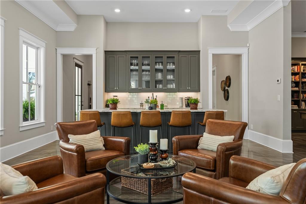 16200 Henderson Road Milton, GA 30004 - Photo 55 of 95 a living room with furniture and a large window