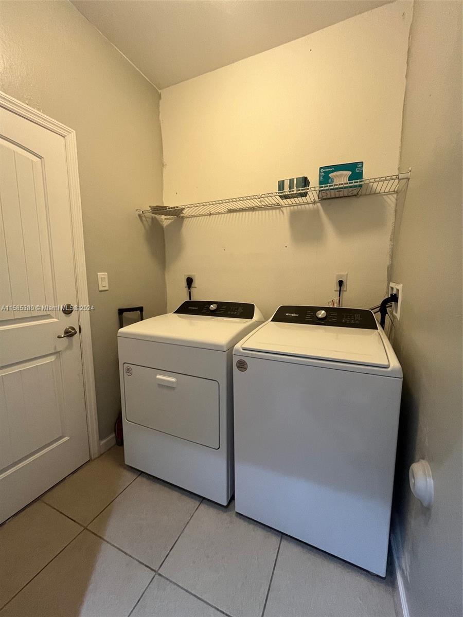 11879 Southwest 253rd Terrace Homestead, FL 33032 - Photo 20 of 26 a utility room with dryer and washer