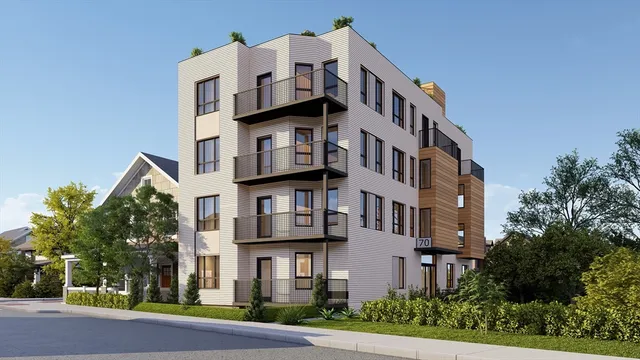 a view of a building with a street