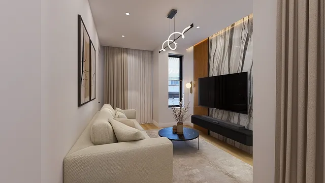 a living room with furniture and a flat screen tv