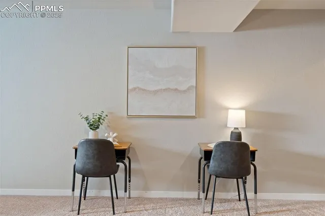 a view of a workspace with furniture