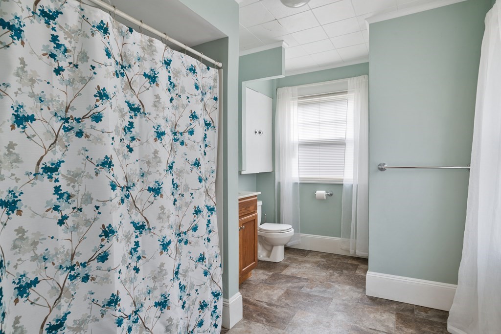 128 Shawmut Street Springfield, MA 01108 - Photo 26 of 39 a bathroom with a toilet and a shower