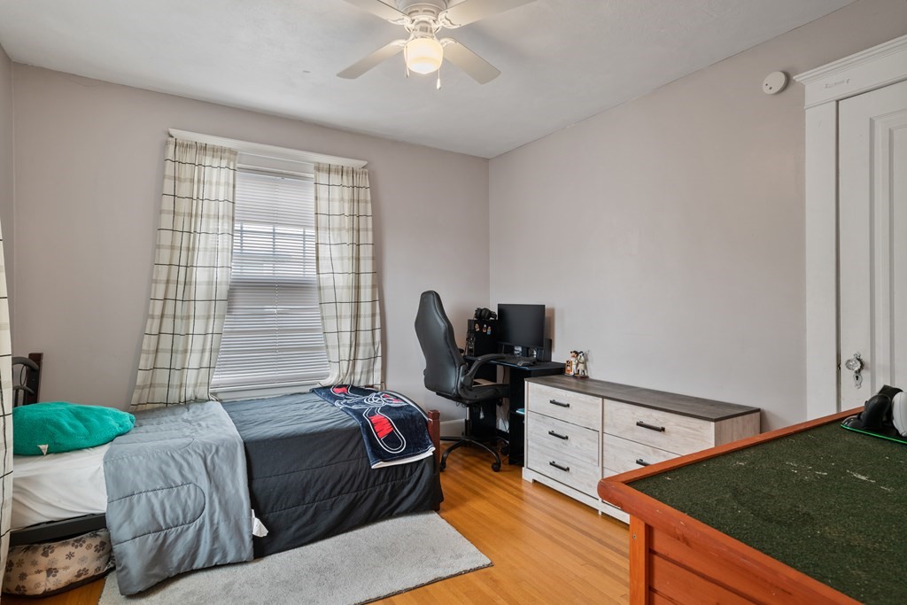 128 Shawmut Street Springfield, MA 01108 - Photo 32 of 39 a living room with furniture and a window