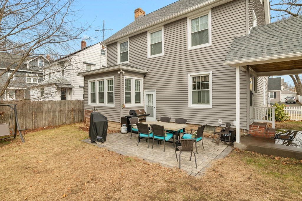 128 Shawmut Street Springfield, MA 01108 - Photo 35 of 39 a backyard of a house with seating space
