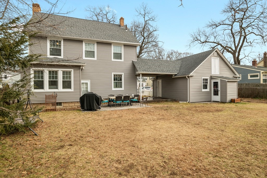 128 Shawmut Street Springfield, MA 01108 - Photo 36 of 39 a front view of a house with a yard