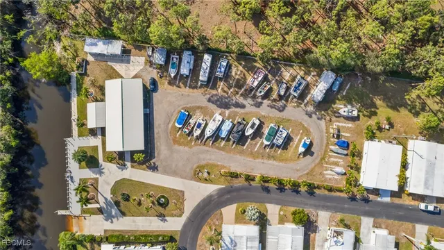 an aerial view of a house with a swimming pool