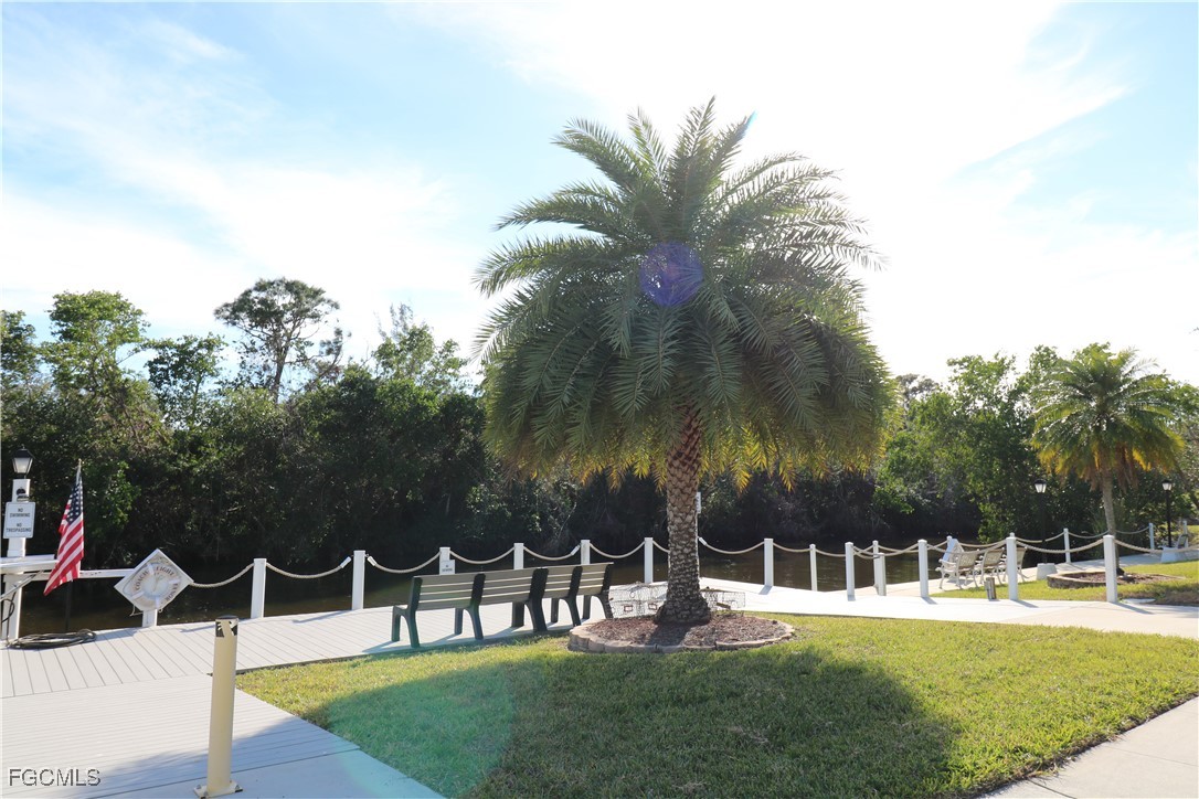 68 Sturbridge Lane Fort Myers, FL 33908 - Photo 20 of 23 a view of a house with a yard