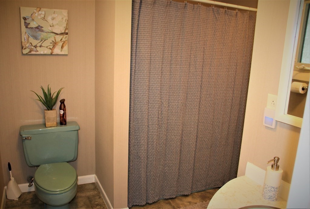 144 Partridgeville Road Templeton, MA 01468 - Photo 24 of 33 a a bathroom with a toilet and a shower curtain