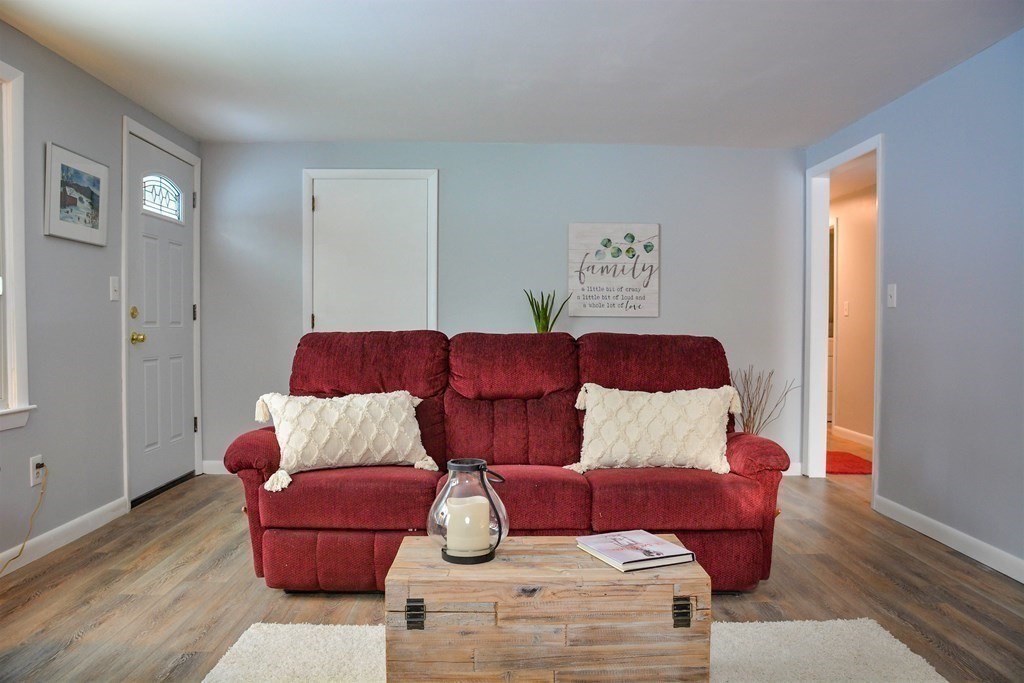 144 Partridgeville Road Templeton, MA 01468 - Photo 8 of 33 a living room with furniture and wooden floor