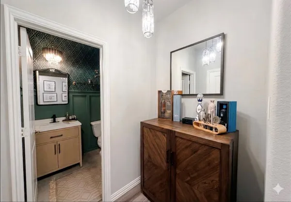 a view of a house with a yard and deck