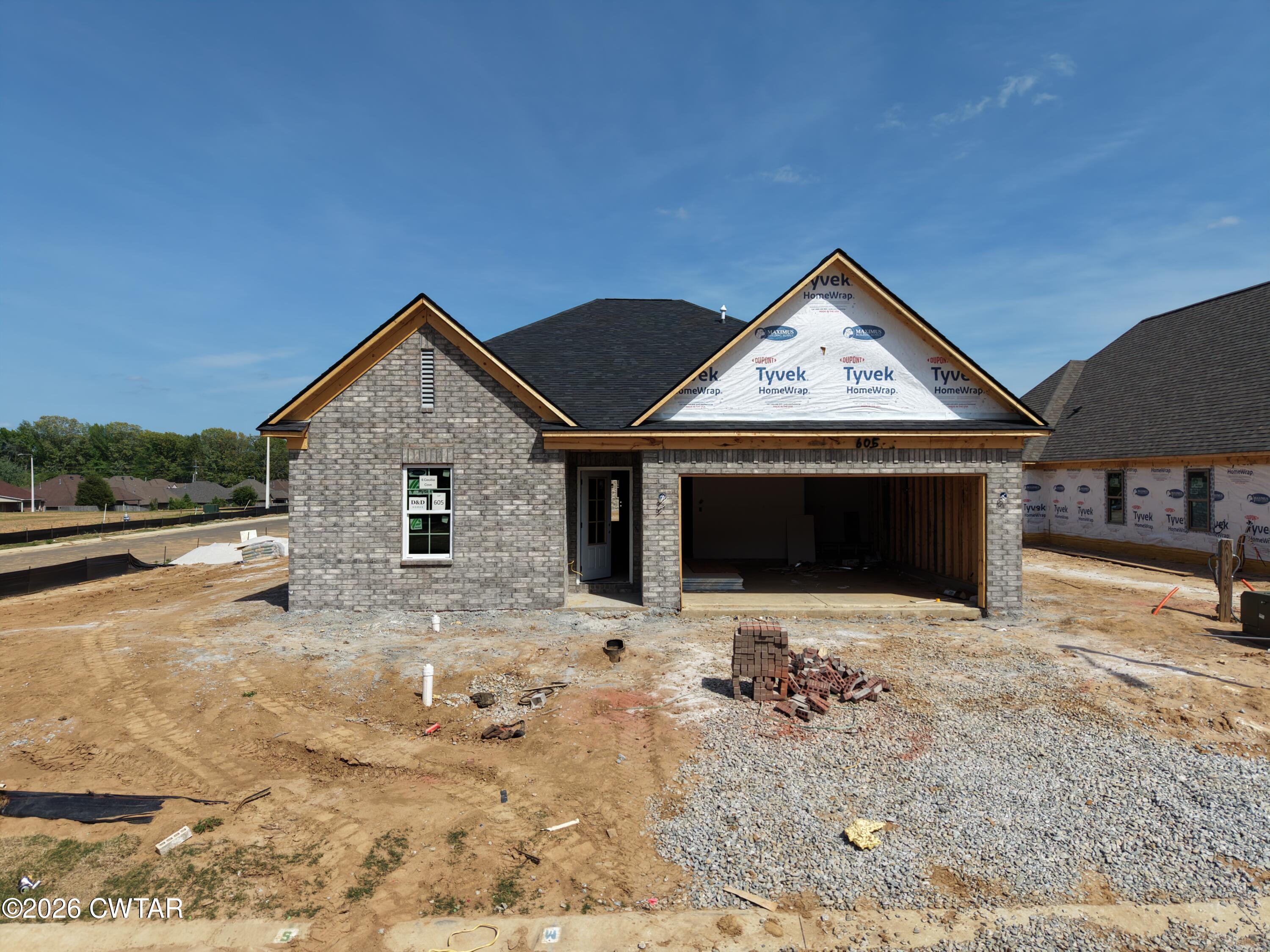 6 Cecellia Cove Jackson, TN 38305 - Photo 2 of 11 a view of a house with a yard