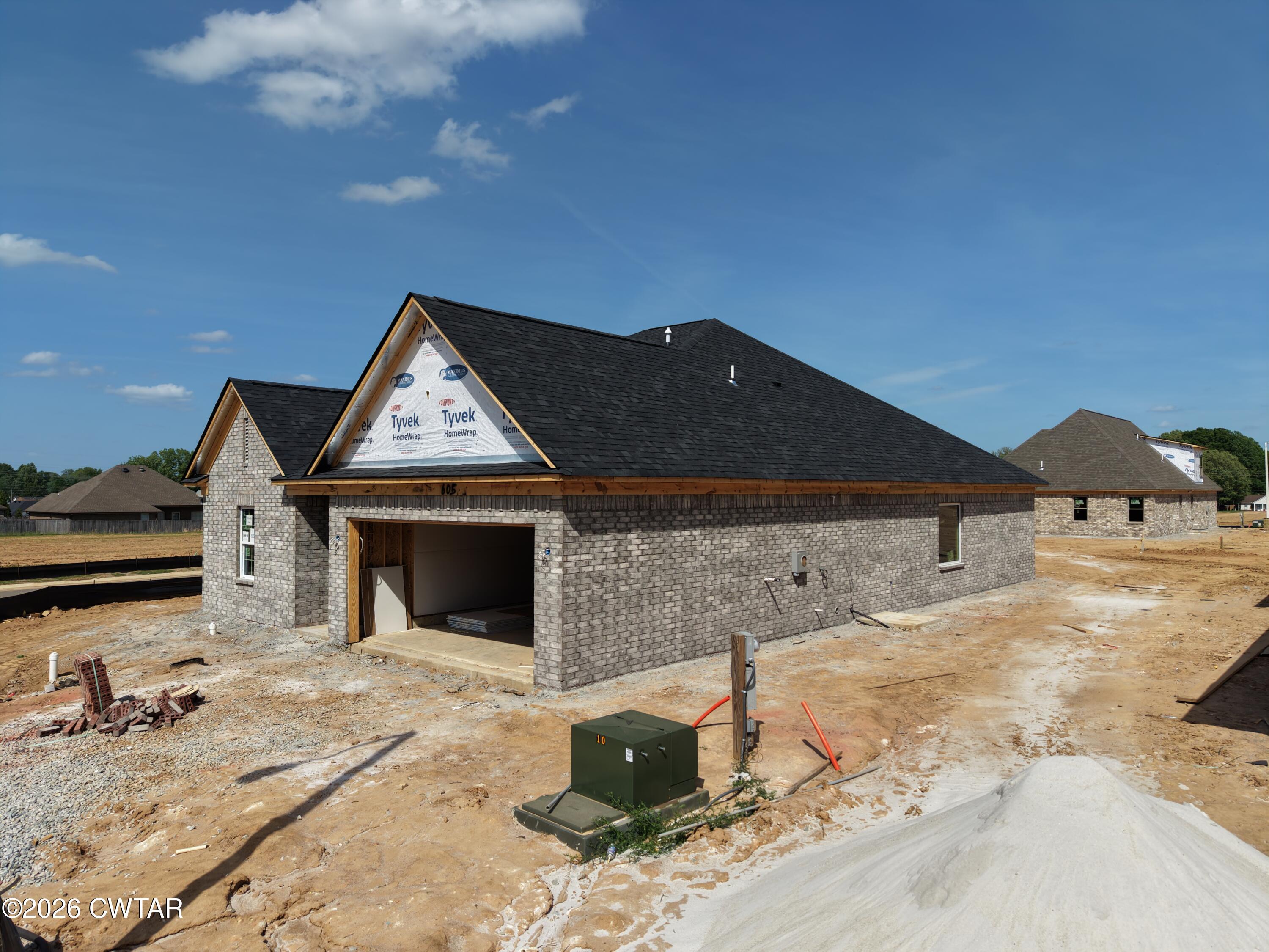 6 Cecellia Cove Jackson, TN 38305 - Photo 4 of 11 a front view of a house with yard