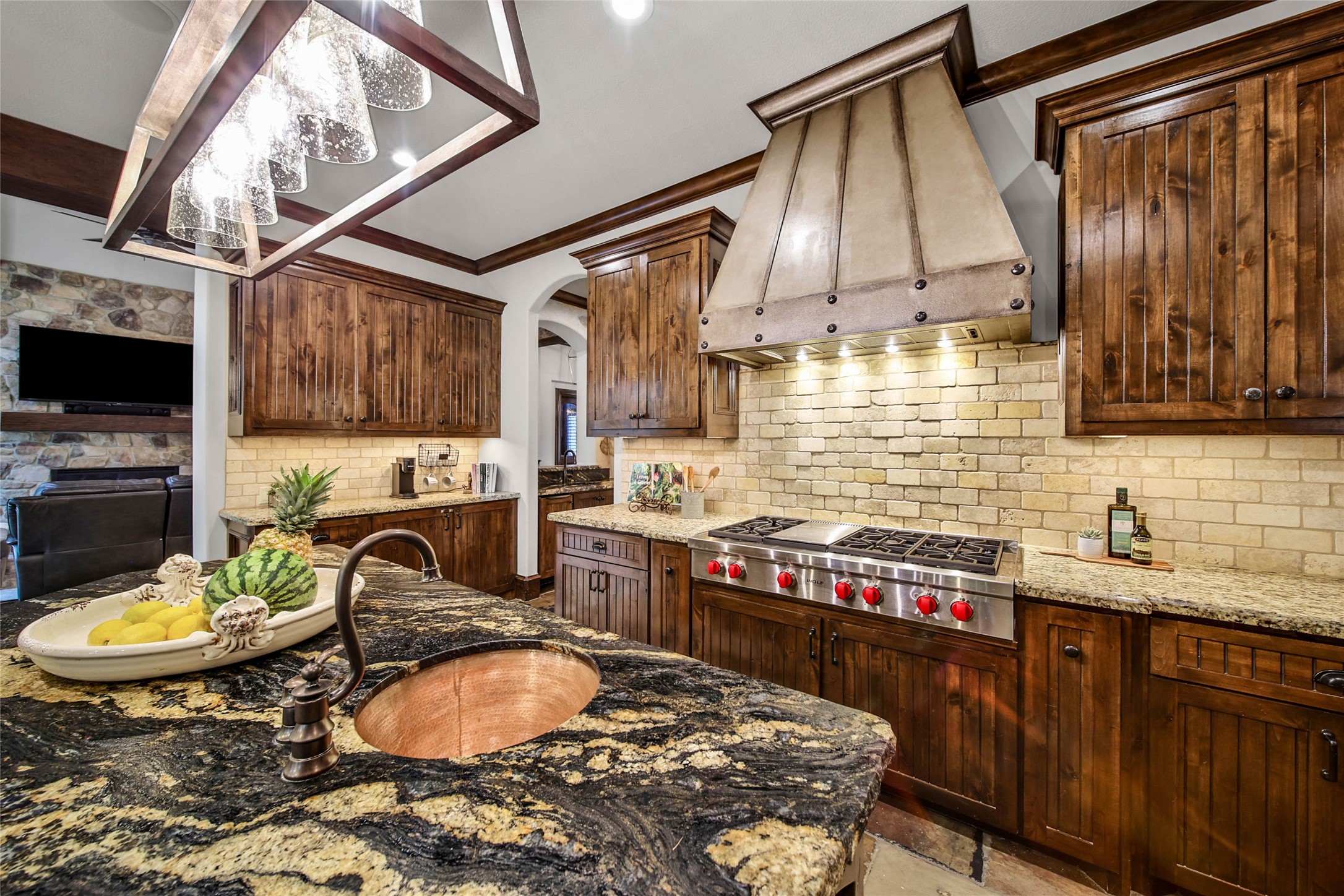 852 Eagle Pointe Montgomery, TX 77316 - Photo 13 of 48 a kitchen with a stove a sink and a refrigerator