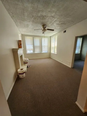 an empty room with windows