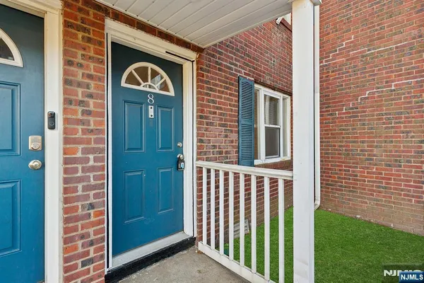a front view of a house with a door