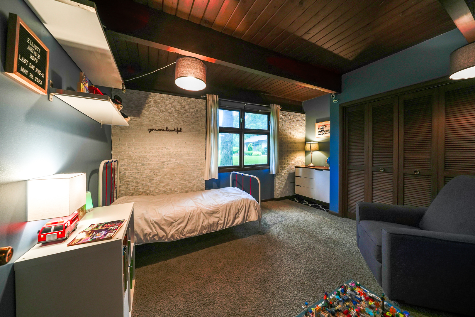 916 Forest Drive Elgin, IL 60123 - Photo 3 of 26 a bedroom with a bed and a window