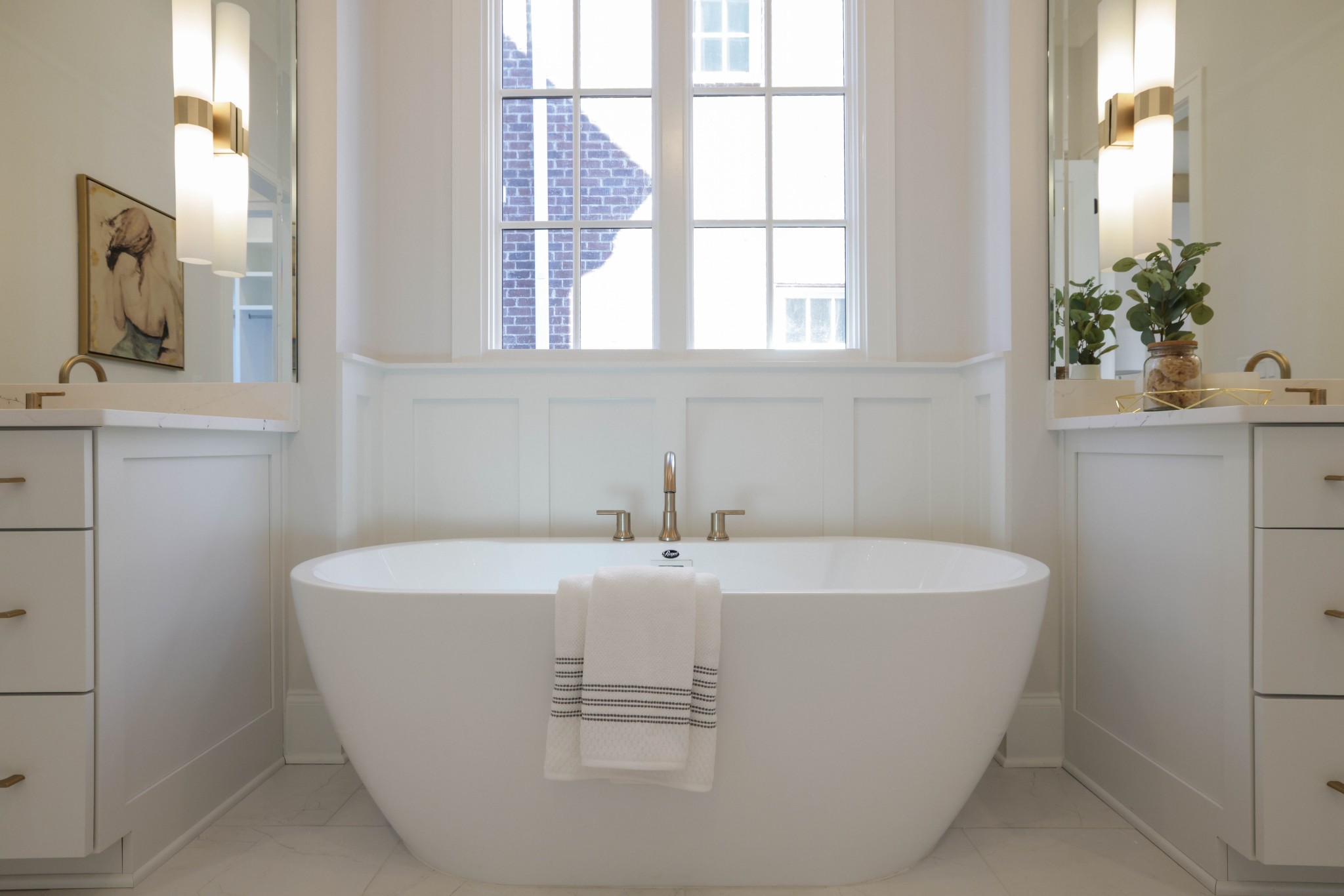 657 Jackson Falls Drive Nashville, TN 37221 - Photo 23 of 63 a white bath tub sitting in a bathroom