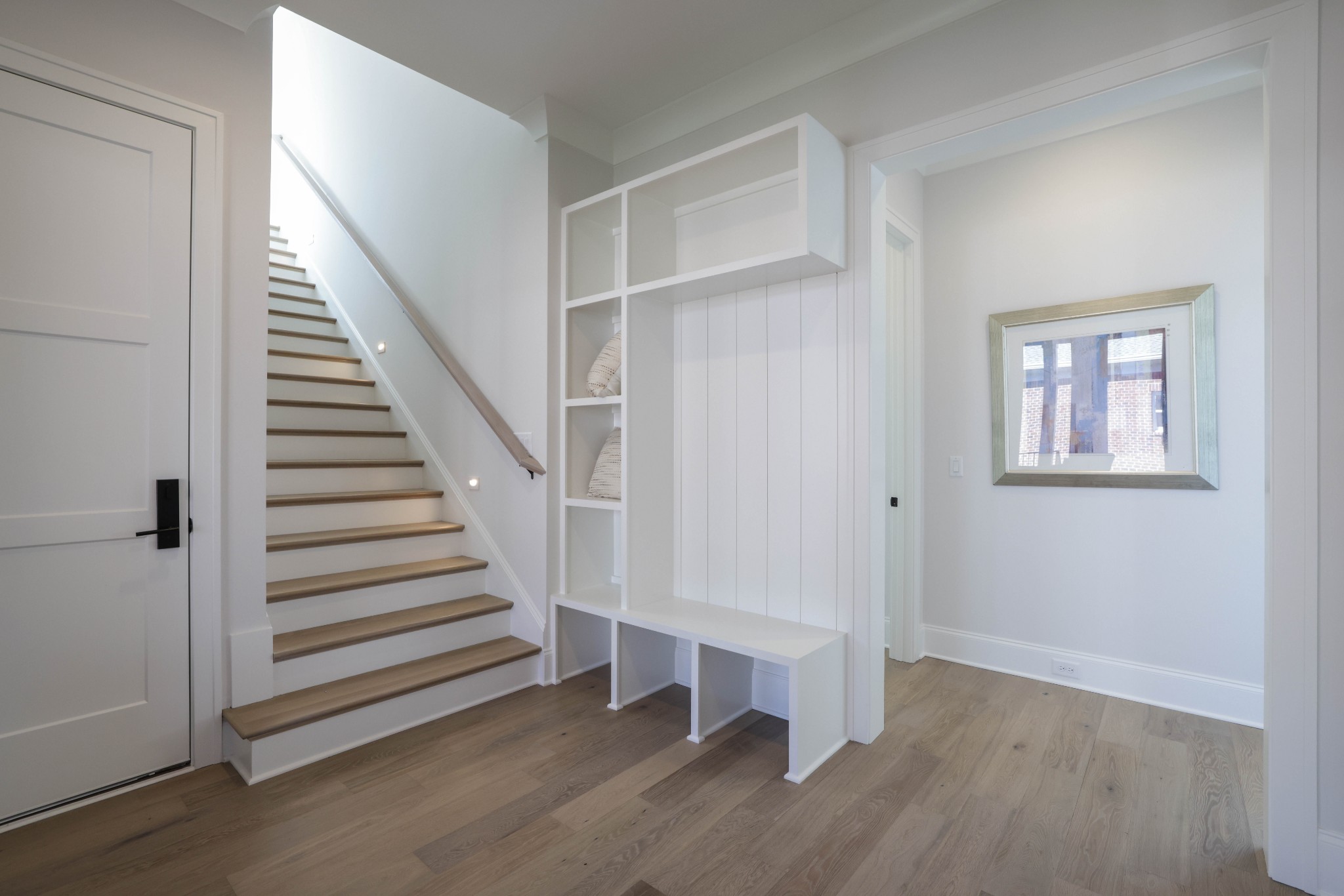657 Jackson Falls Drive Nashville, TN 37221 - Photo 29 of 63 a view of entryway with stairs and wooden floor