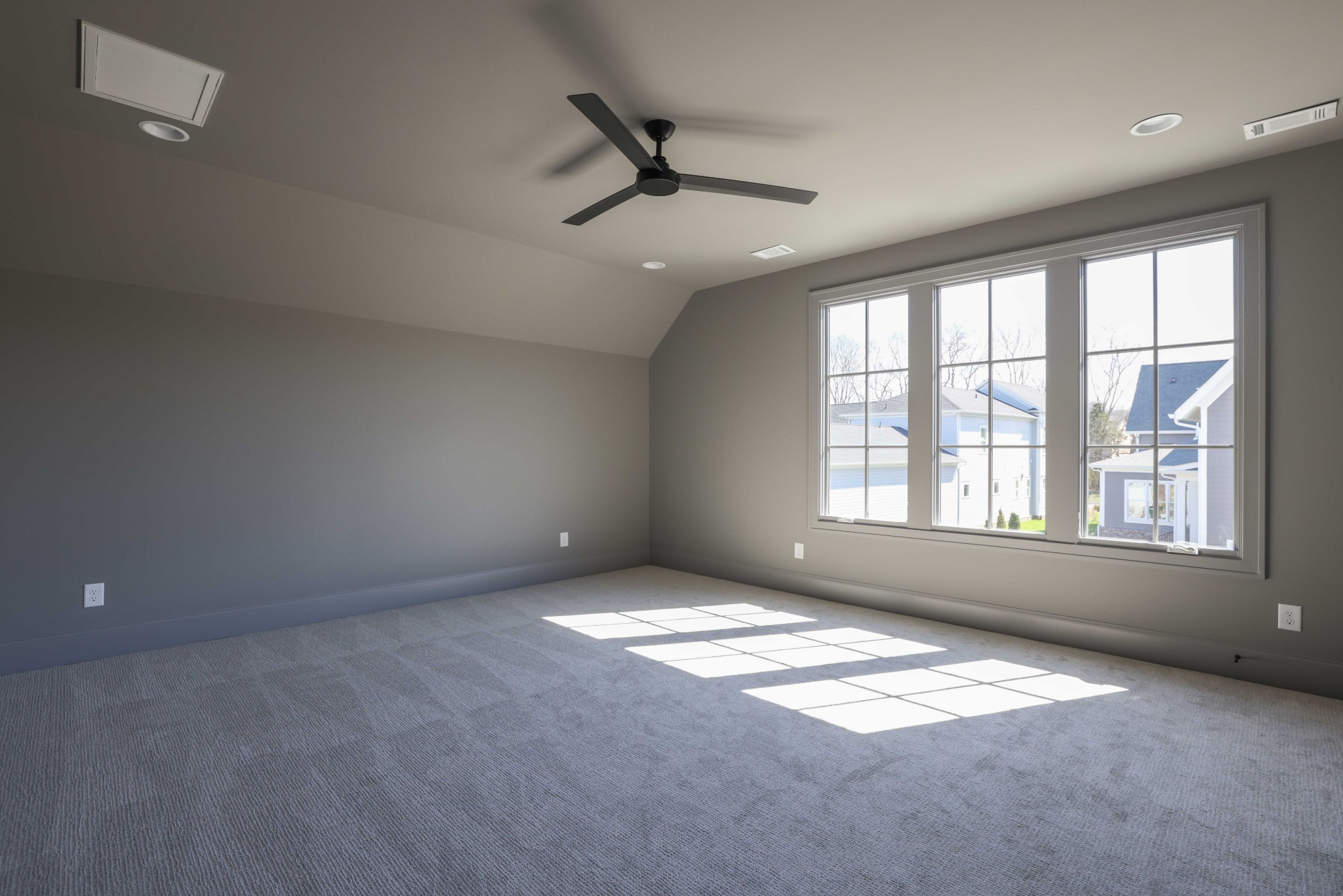 657 Jackson Falls Drive Nashville, TN 37221 - Photo 38 of 63 en empty room with windows and ceiling fan