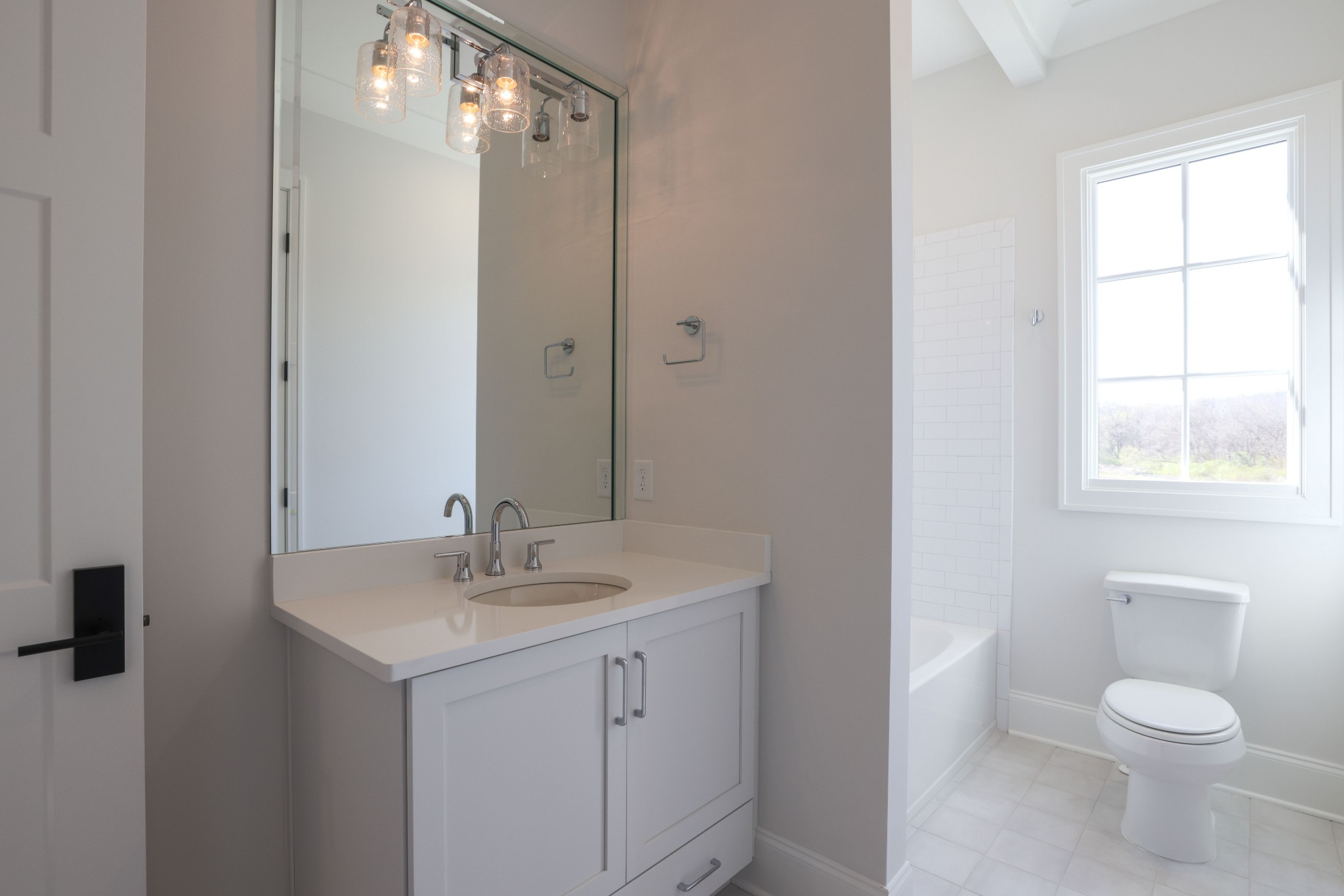 657 Jackson Falls Drive Nashville, TN 37221 - Photo 44 of 63 a bathroom with a toilet sink and mirror