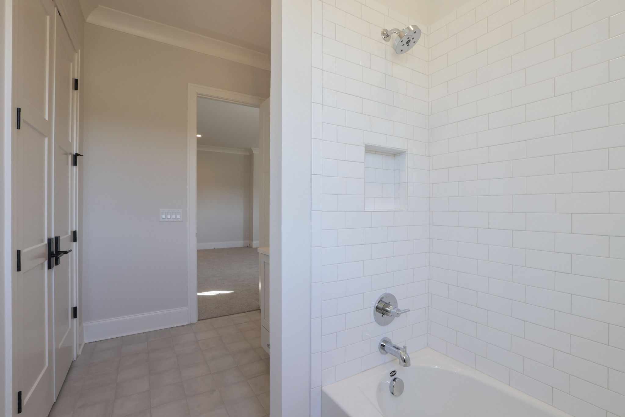 657 Jackson Falls Drive Nashville, TN 37221 - Photo 45 of 63 a bathroom with a bathtub