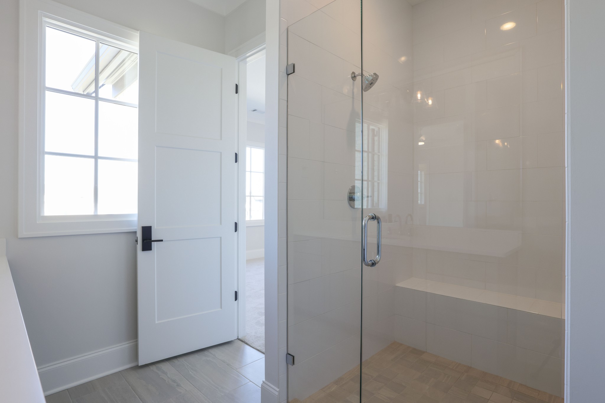 657 Jackson Falls Drive Nashville, TN 37221 - Photo 49 of 63 a bathroom with a bathtub and a shower