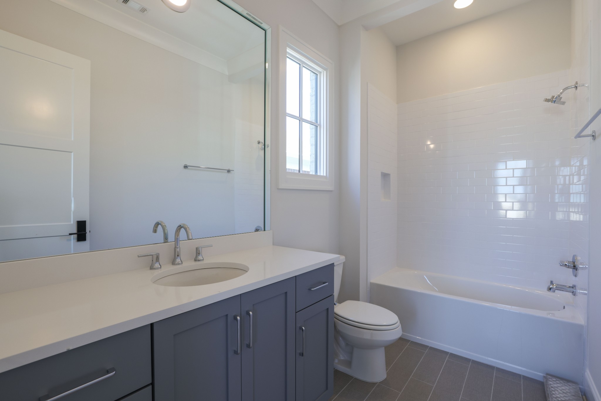 657 Jackson Falls Drive Nashville, TN 37221 - Photo 52 of 63 a bathroom with a sink a toilet and shower