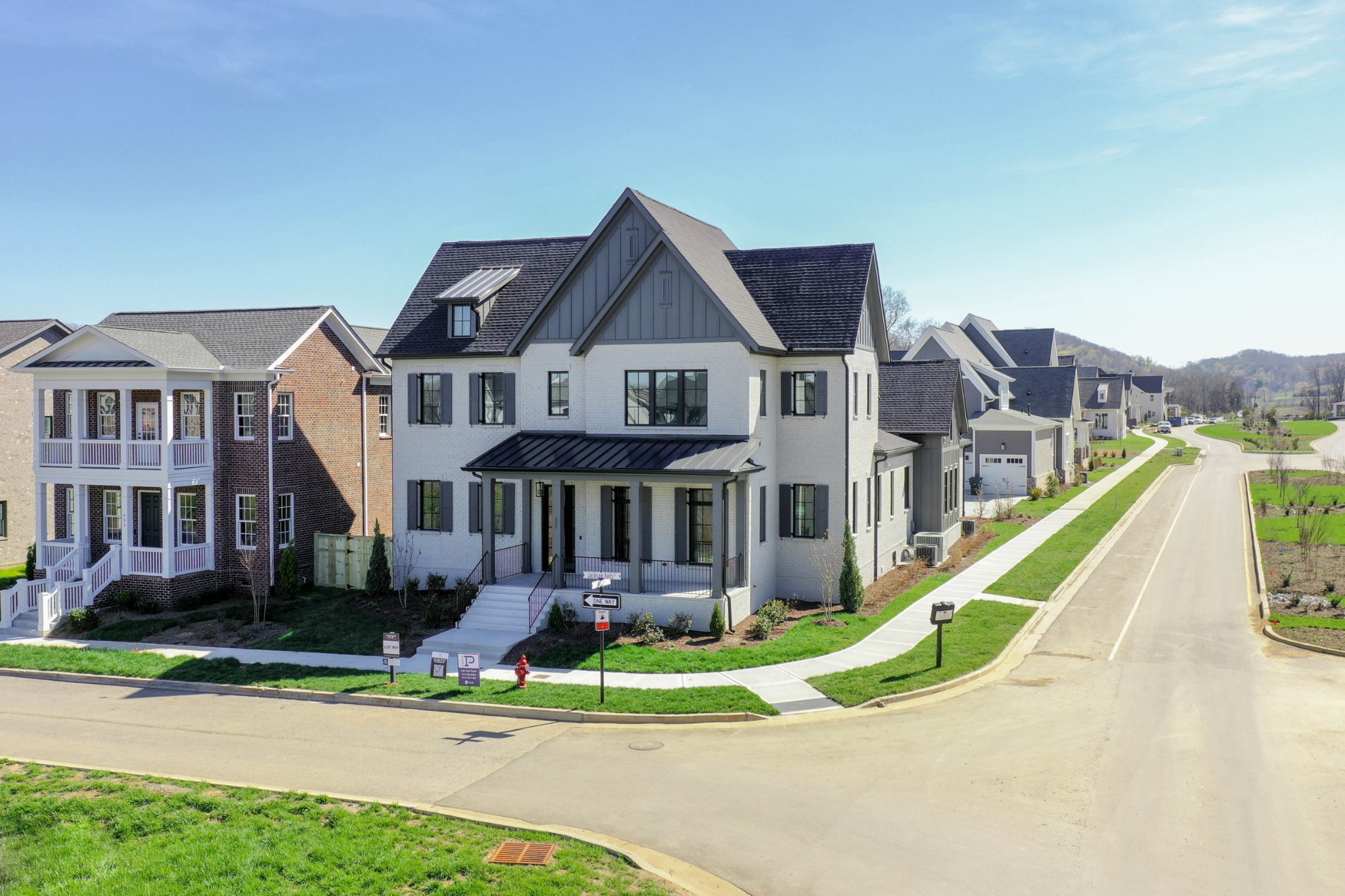 657 Jackson Falls Drive Nashville, TN 37221 - Photo 55 of 63 a front view of a house with a yard