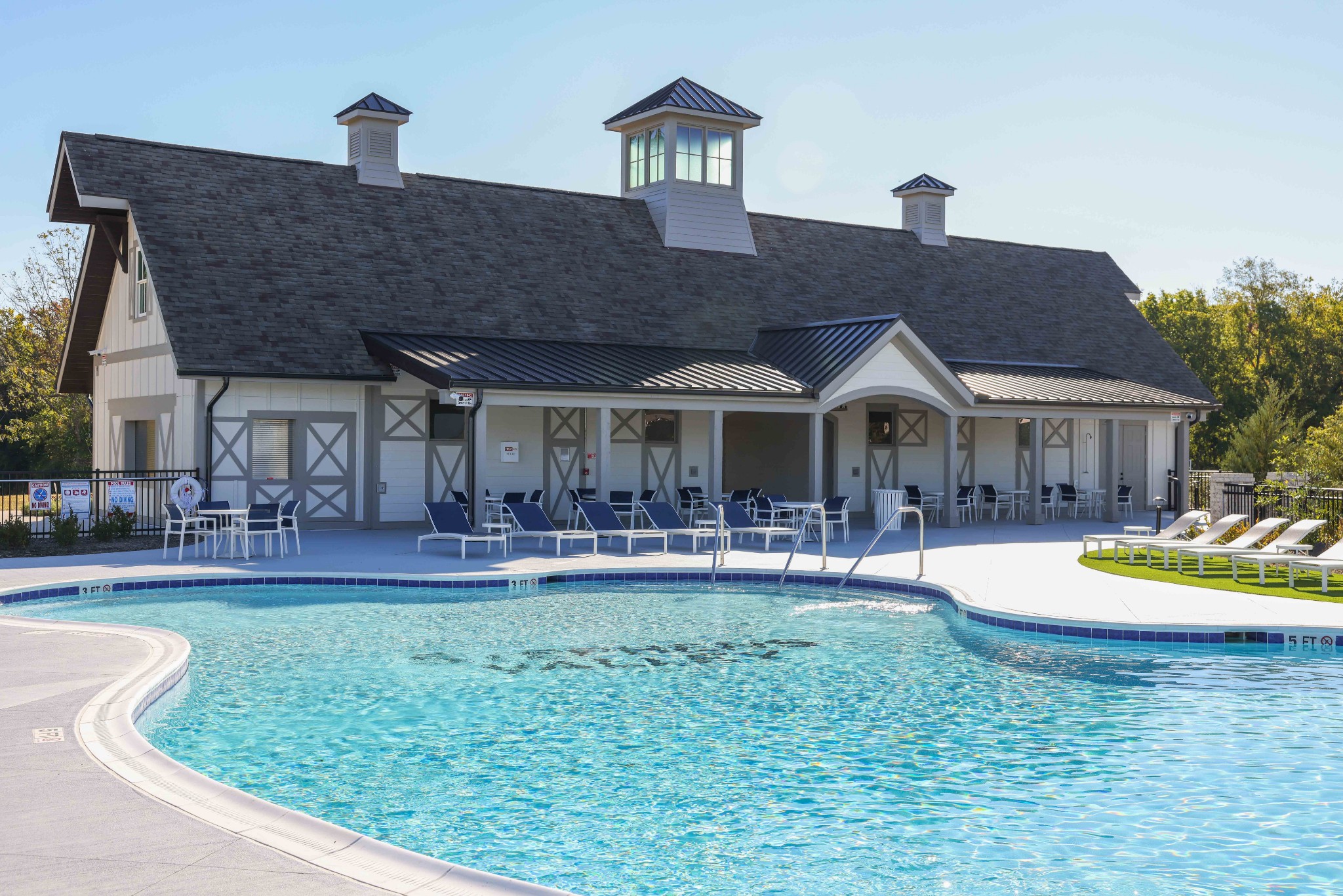 657 Jackson Falls Drive Nashville, TN 37221 - Photo 59 of 63 a front view of a house with swimming pool having outdoor seating