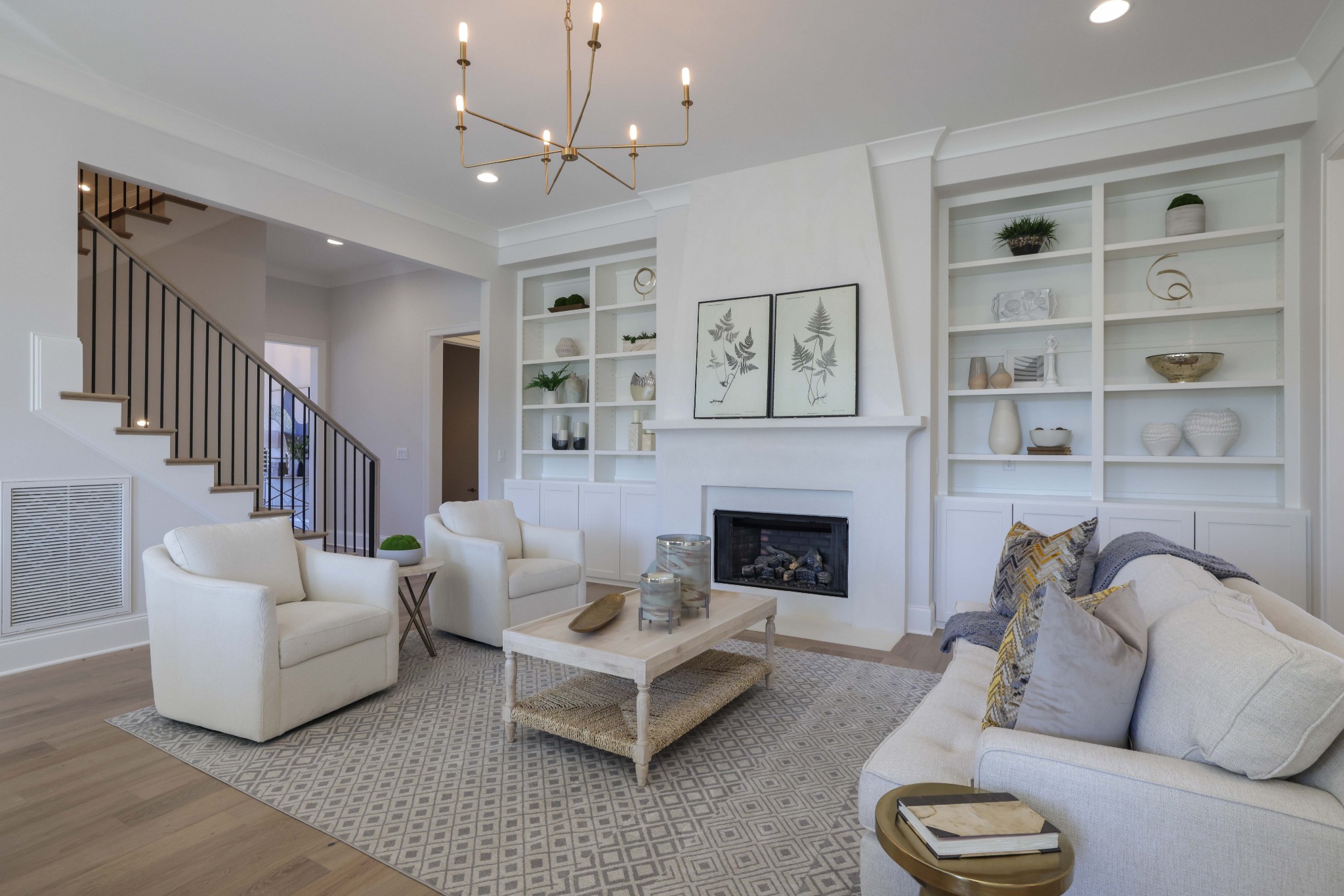 657 Jackson Falls Drive Nashville, TN 37221 - Photo 8 of 63 a living room with furniture potted plant and a fireplace
