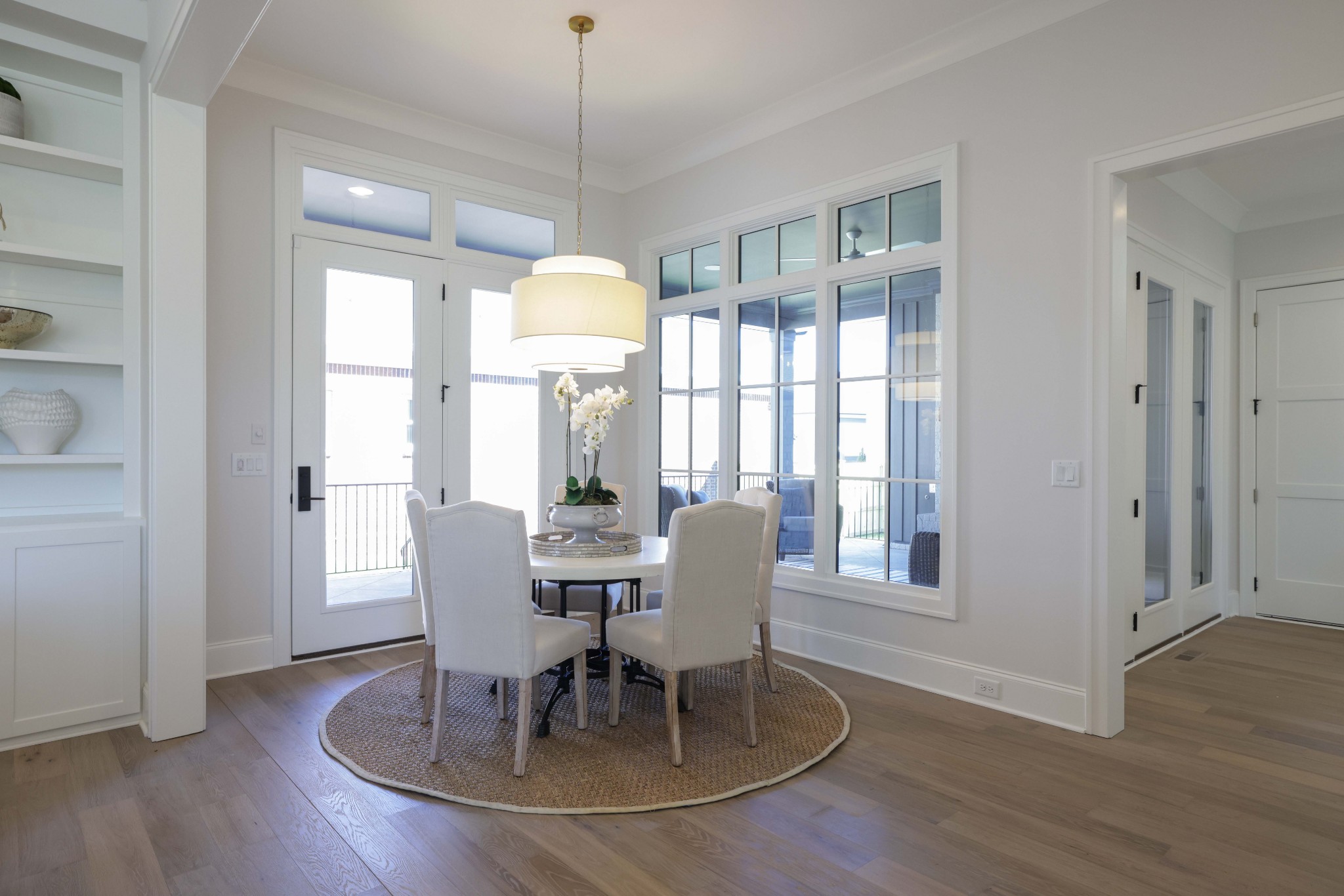 657 Jackson Falls Drive Nashville, TN 37221 - Photo 9 of 63 a view of a dining room with furniture window and wooden floor