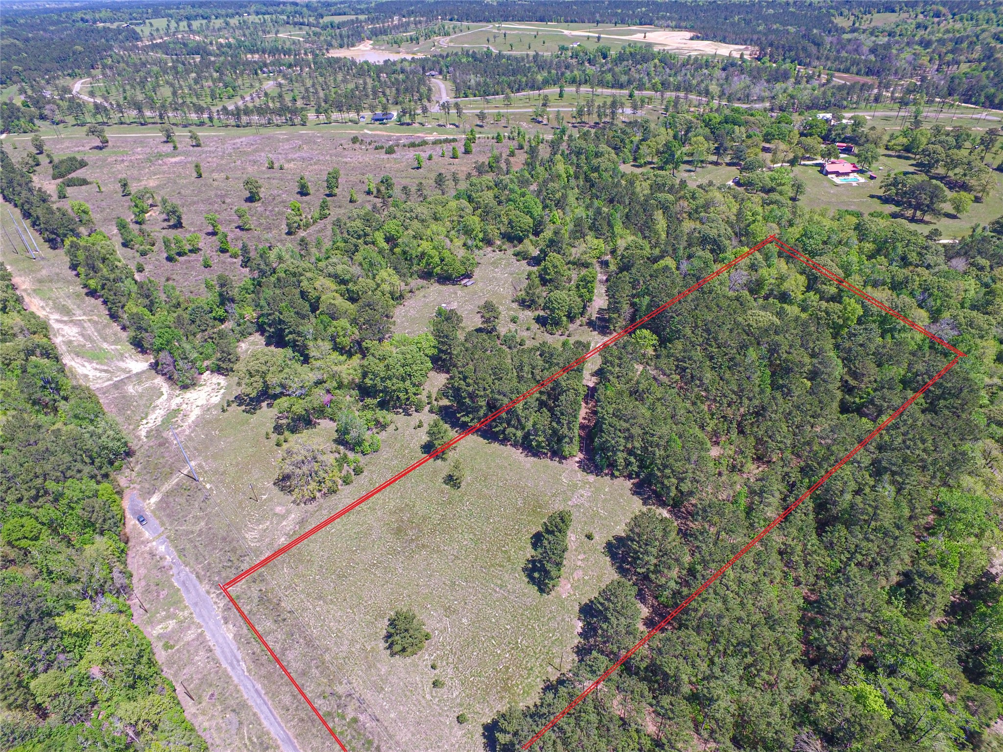 280 Waka Livingston, TX 77351 - Photo 2 of 26 an aerial view of a house with a yard and tree s